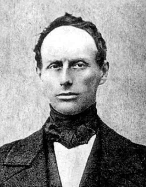 Portrait of Christian Doppler, a man with dark hair and side whiskers in a dark coat