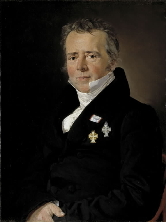 Painted portrait of Hans Christian Ørsted, a man with gray hair in a dark coat wearing a decoration