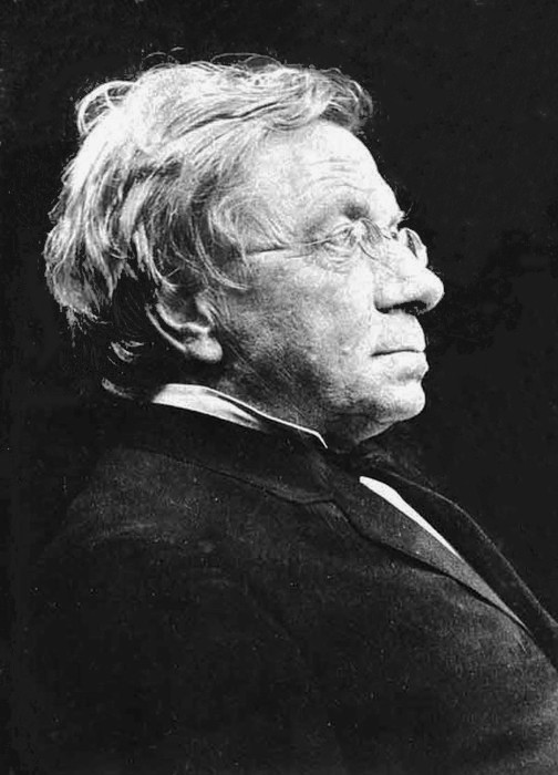 Portrait of Johann Balmer, an elderly man with white hair and glasses, in profile