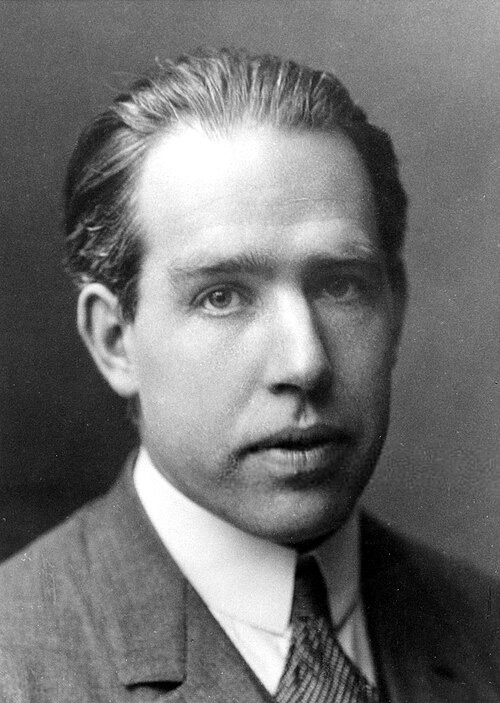 Portrait of Niels Bohr in a suit and tie